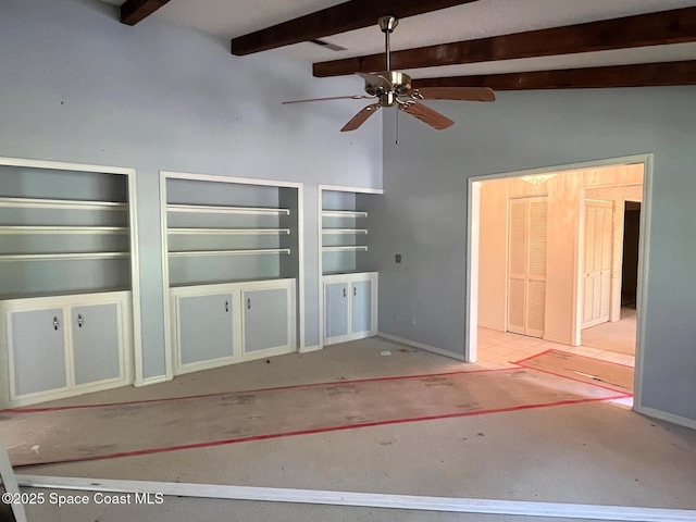 unfurnished living room with beam ceiling and ceiling fan