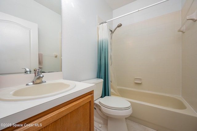 full bathroom with vanity, toilet, and shower / tub combo