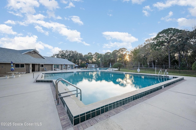 view of pool with a patio area