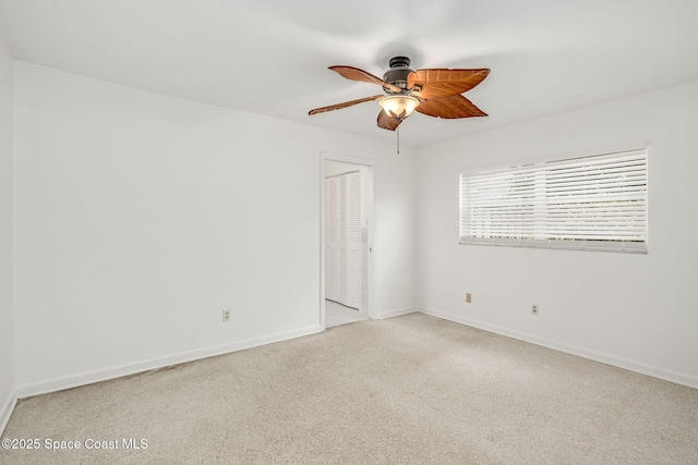 spare room with ceiling fan