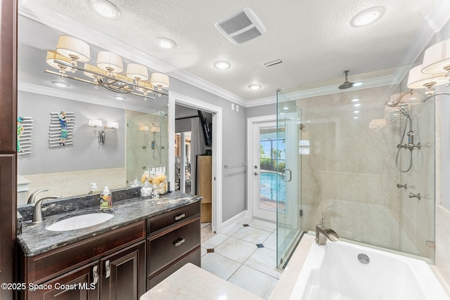 bathroom featuring independent shower and bath, ornamental molding, vanity, tile patterned floors, and a textured ceiling