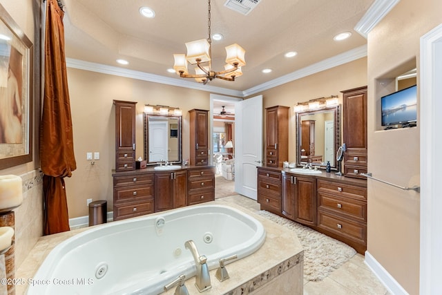 bathroom featuring vanity, tiled bath, a notable chandelier, and crown molding