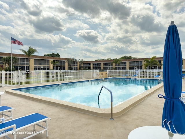 community pool with fence