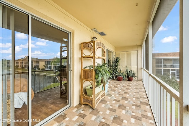 balcony featuring visible vents