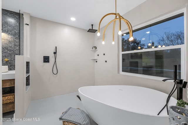 bathroom featuring a tub to relax in