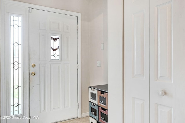 entrance foyer featuring a healthy amount of sunlight