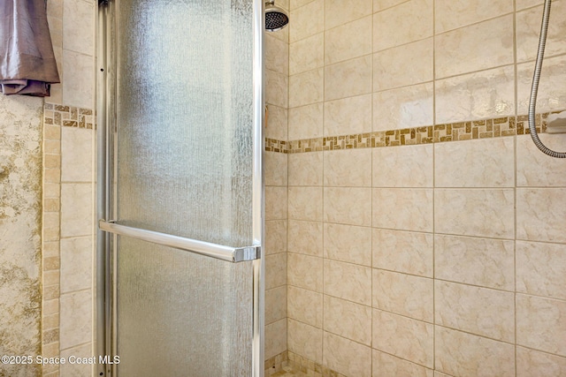 bathroom with an enclosed shower