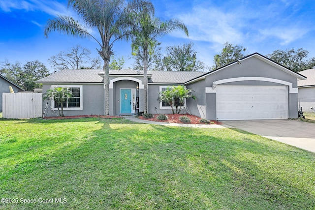 ranch-style home with a garage and a front yard