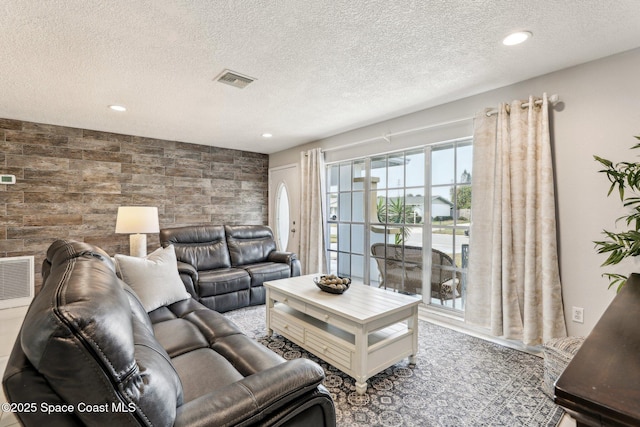 living room featuring a textured ceiling