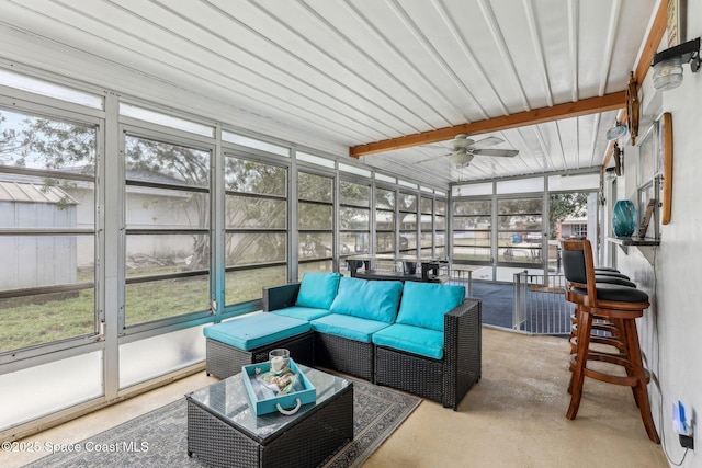 sunroom / solarium with ceiling fan