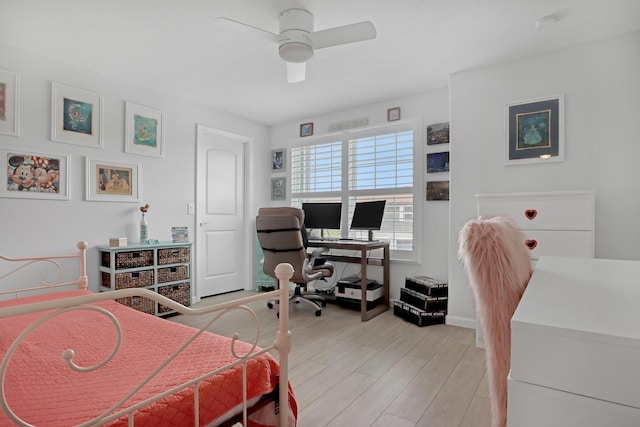 bedroom featuring ceiling fan and light wood-type flooring