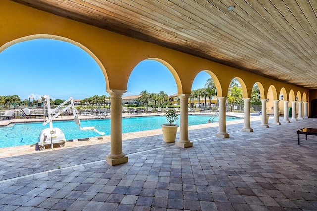 view of swimming pool featuring a patio