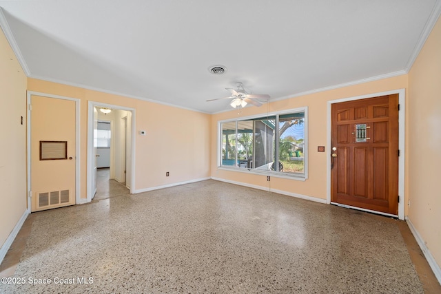 entryway with ceiling fan and ornamental molding