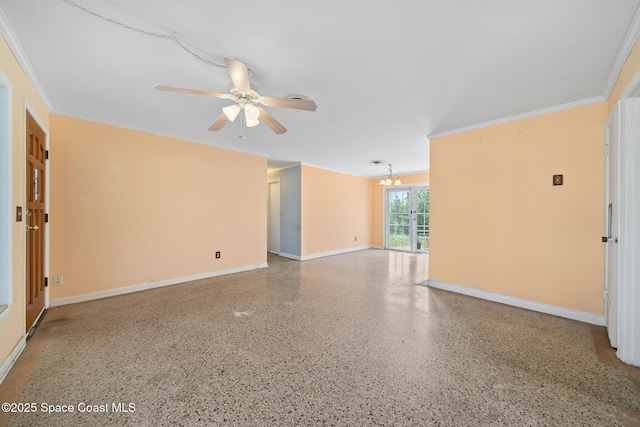 unfurnished room featuring ornamental molding and ceiling fan with notable chandelier