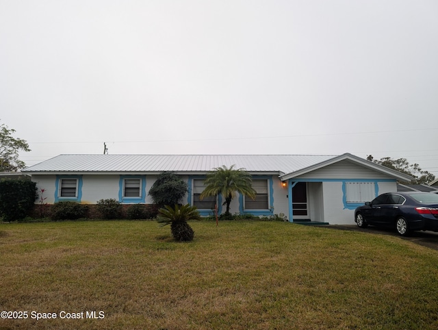 single story home featuring a front yard