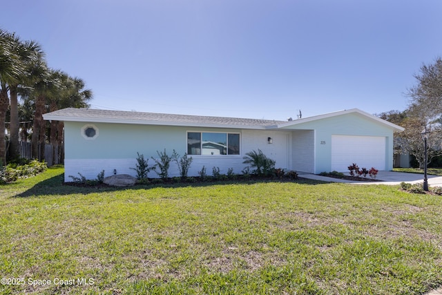 single story home featuring a front yard and a garage