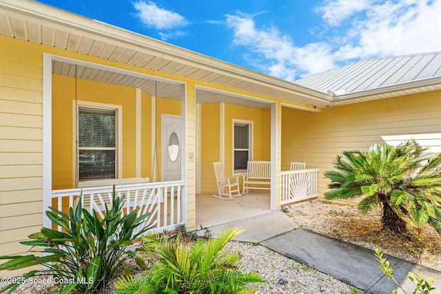 entrance to property with a porch