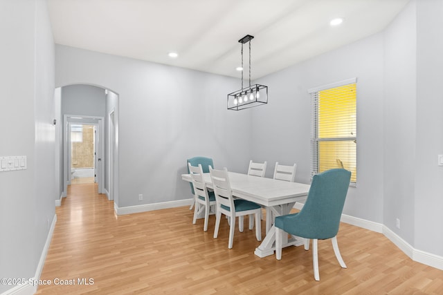 dining area featuring light wood-type flooring