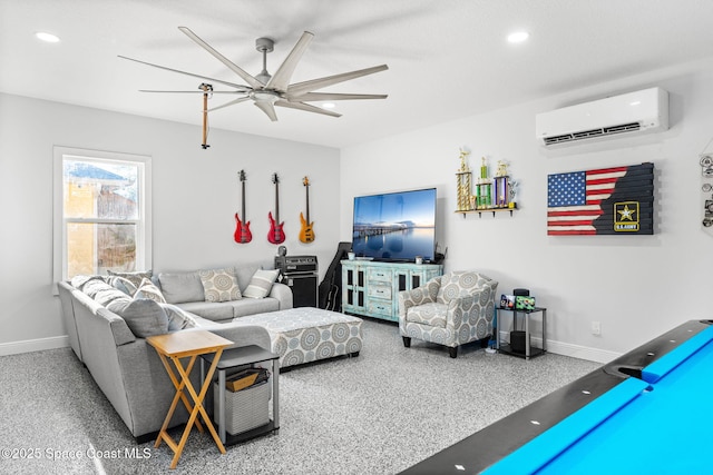 living room with an AC wall unit and ceiling fan