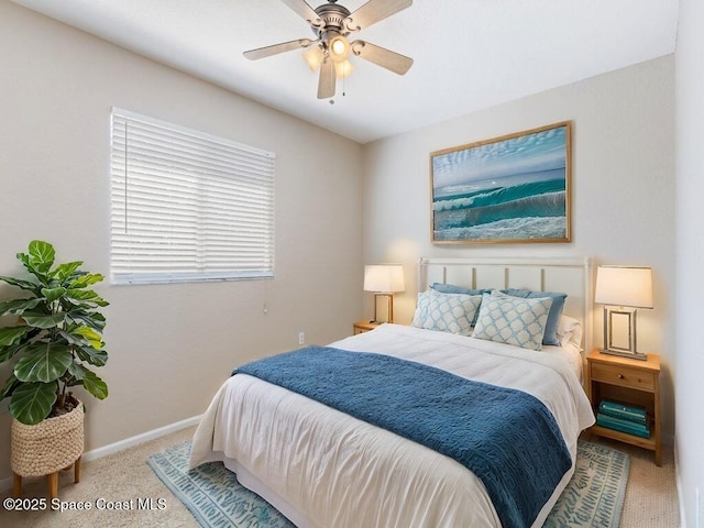 bedroom featuring ceiling fan and carpet floors