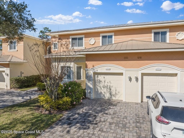 view of property featuring a garage