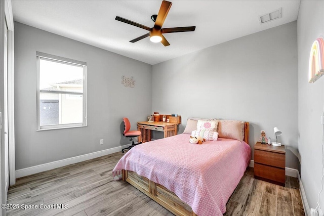 bedroom featuring ceiling fan and light wood-type flooring