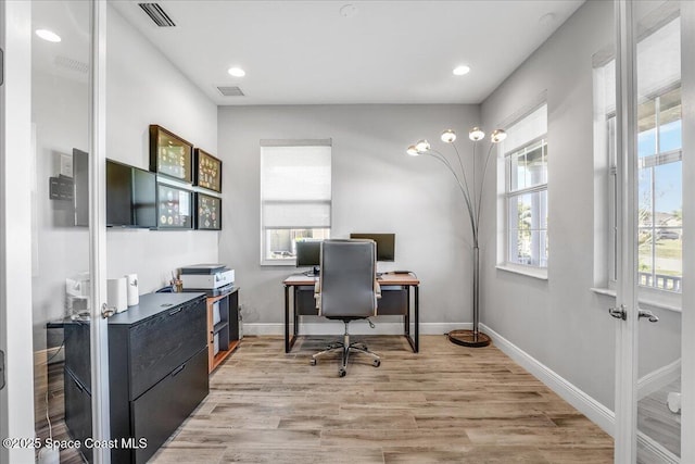 office featuring light hardwood / wood-style floors