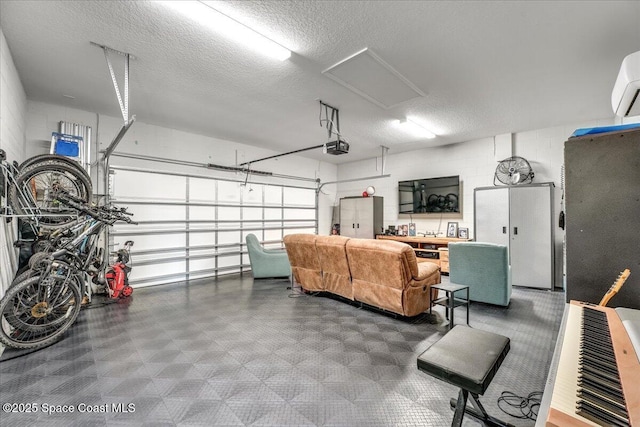 garage with a wall mounted air conditioner