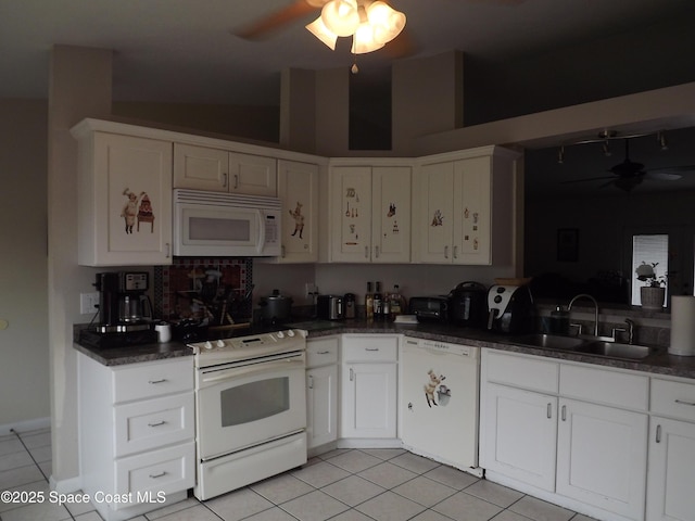 kitchen featuring white appliances, light tile patterned floors, sink, and white cabinets