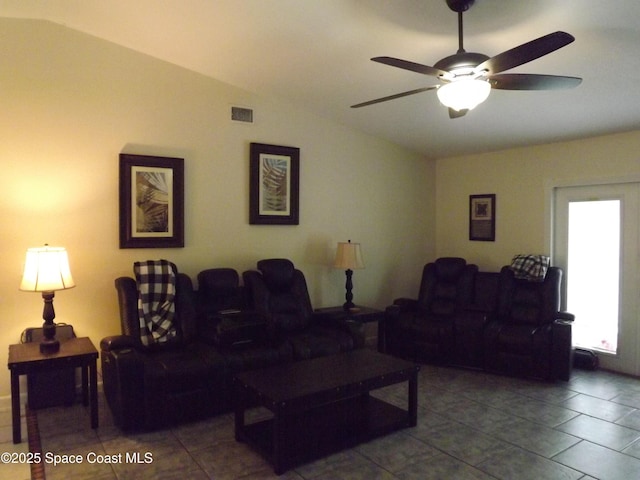 living room featuring lofted ceiling and ceiling fan