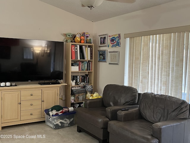 living room featuring ceiling fan