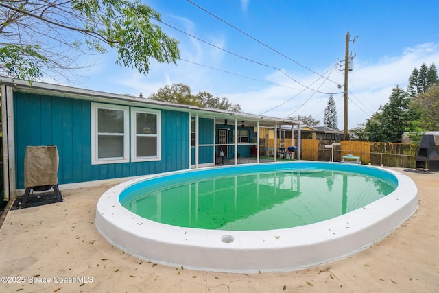 view of pool with fence and a fenced in pool