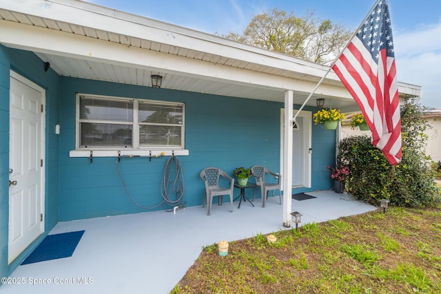 entrance to property with covered porch