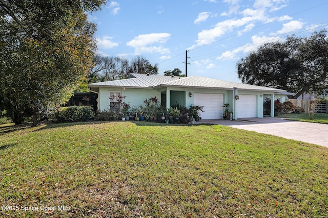 single story home featuring a garage and a front yard