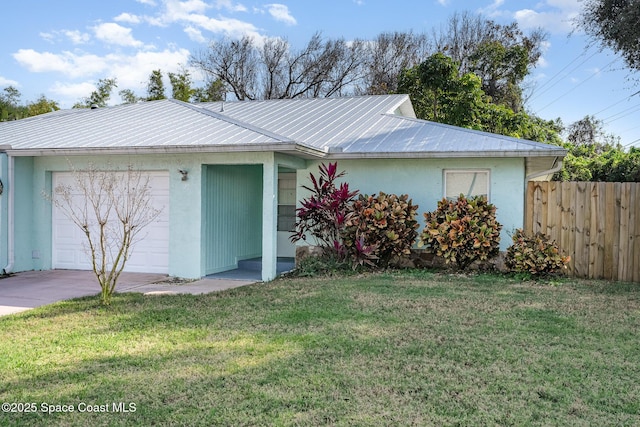 single story home with a garage and a front yard