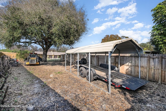 view of yard featuring a carport