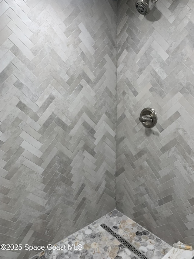 interior space with a tile shower