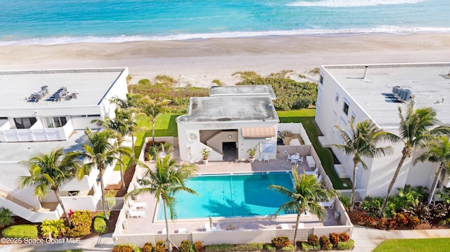 aerial view featuring a water view and a beach view