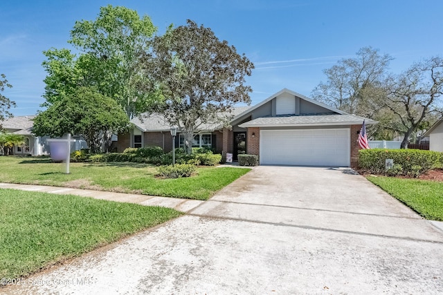 ranch-style home with a garage, brick siding, driveway, and a front lawn