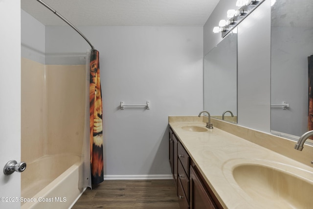 bathroom featuring vanity, wood-type flooring, and shower / bath combination with curtain