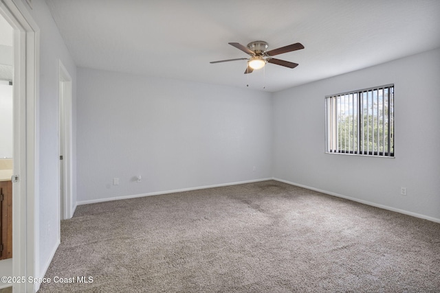 unfurnished room featuring carpet flooring and ceiling fan