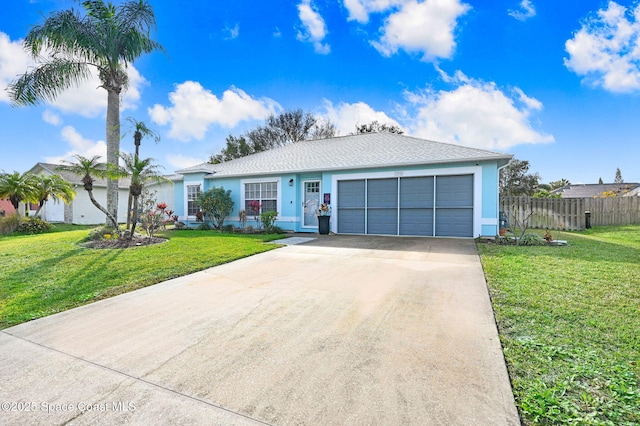 ranch-style home featuring a garage and a front yard