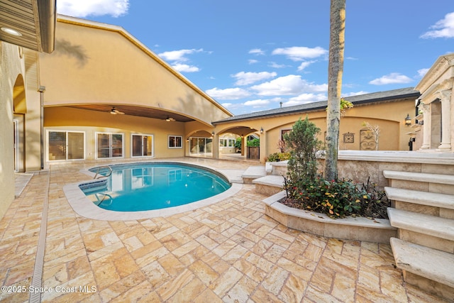 view of swimming pool featuring a patio area