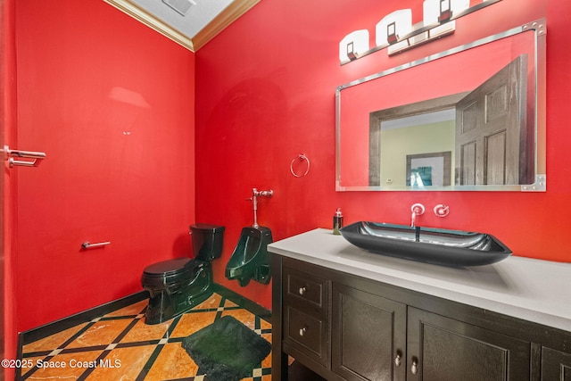 bathroom featuring vanity and crown molding