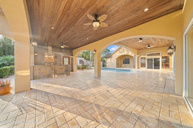 view of patio with ceiling fan