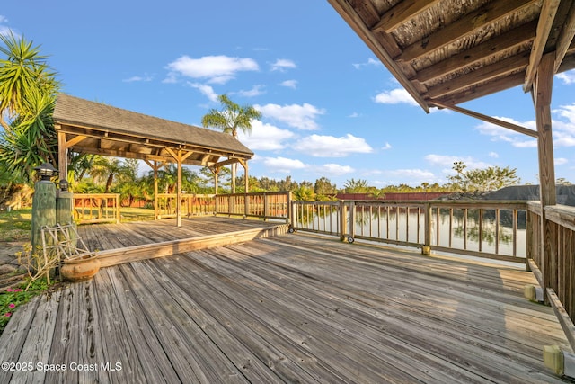 deck featuring a water view