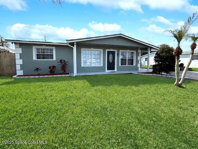 ranch-style house featuring a front lawn