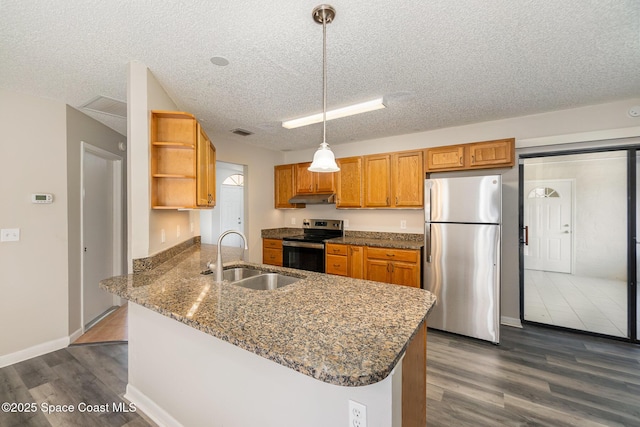 kitchen featuring pendant lighting, sink, dark hardwood / wood-style flooring, kitchen peninsula, and stainless steel appliances