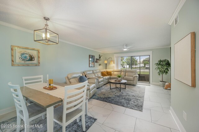 dining area featuring ornamental molding and ceiling fan with notable chandelier