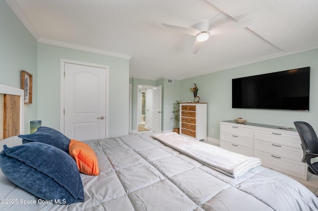 bedroom featuring crown molding, ceiling fan, a textured ceiling, and ensuite bath